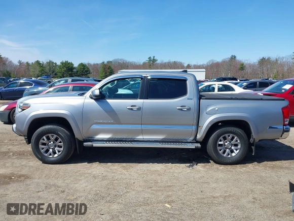2017 Toyota Tacoma SR5 with VIN 3TMCZ5AN9HM117739, listed as a IAAI auction lot 42102292 with 54,739 mi miles and . Bid and sale history available at DreamBid. Image 15.