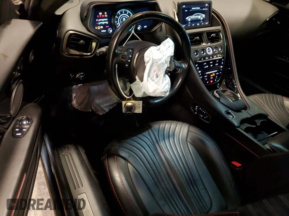 2018 Aston Martin DB11 z VIN SCFRMFAV6JGL03707, wystawiony jako Copart lot #81757644 z przebiegiem Nie podano mil oraz Szkody całkowita. Historia ofert i sprzedaży dostępna na DreamBid. Obrazek 8.