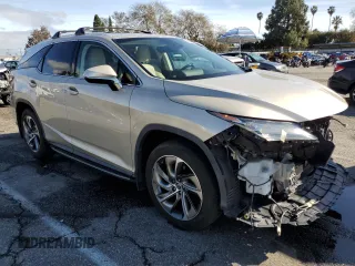 2019 Lexus RX 350L Premium with VIN JTJGZKCAXK2012648, listed as a Copart auction lot 44417555 with 27,464 mi miles and Salvage title. Bid and sale history available at DreamBid. Image 4.