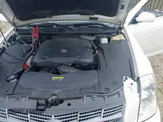 2010 Cadillac STS AWD z VIN 1G6DU6EV4A0102872, wystawiony jako IAAI lot #42348505 z przebiegiem 151 934 mil mil oraz . Historia ofert i sprzedaży dostępna na DreamBid. Obrazek 10.