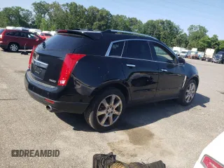 2011 Cadillac SRX Premium Collection with VIN 3GYFNFEYXBS547540, listed as a Copart auction lot 62563895 with 107,136 mi miles and Salvage title. Bid and sale history available at DreamBid. Image 3.