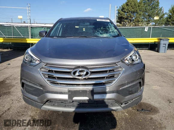 2018 Hyundai Santa Fe 2.4L с VIN 5XYZTDLB1JG542982, выставлен на аукционе Copart как лот 55081465 с пробегом 86 862 миль миль и Списание • Salvage title. История ставок и продаж доступна на DreamBid. Изображение 5.