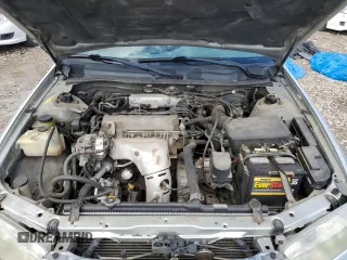 2001 Toyota Camry CE z VIN 4T1BG22K21U058793, wystawiony jako Copart lot #57351245 z przebiegiem 186 095 mil mil oraz Szkoda całkowita • Salvage title. Historia ofert i sprzedaży dostępna na DreamBid. Obrazek 11.