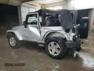 2009 Jeep Wrangler Sahara z VIN 1J4FA54189L789642, wystawiony jako Copart lot #89078145 z przebiegiem 128 902 mil mil oraz Szkoda całkowita • Salvage title. Historia ofert i sprzedaży dostępna na DreamBid. Obrazek 2.