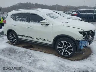 2017 Nissan Rogue SL with VIN 5N1AT2MV9HC792104, listed as a IAAI auction lot 40991192 with 82,393 mi miles. Bid and sale history available at carsss.com. Image 1.