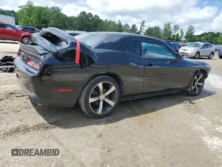 2016 Dodge Challenger R/T Plus с VIN 2C3CDZBT1GH349739, выставлен на аукционе Copart как лот 58403785 с пробегом 113 381 миль миль и Списание • Salvage title. История ставок и продаж доступна на DreamBid. Изображение 3.