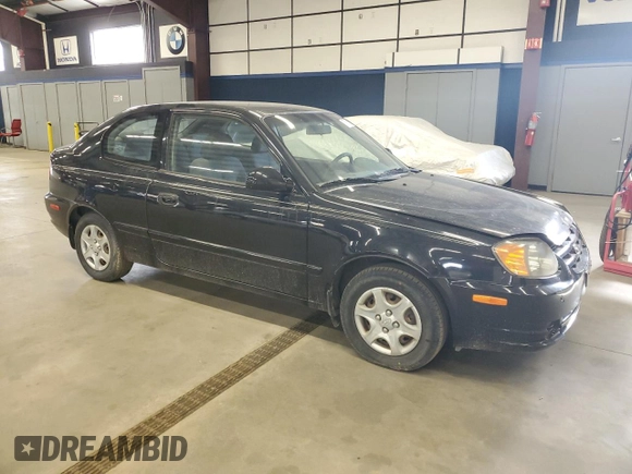 2005 Hyundai Accent GLS with VIN KMHCG35C95U327960, listed as a Copart auction lot 77151314 with 101,556 mi miles and Clean Title. Bid and sale history available at carsss.com. Image 4.
