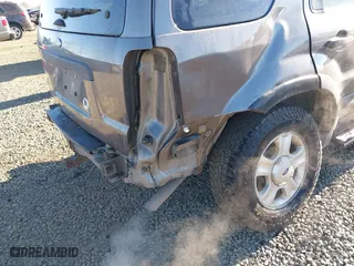 2003 Ford Escape XLT Popular 2 with VIN 1FMCU93143KB10936, listed as a IAAI auction lot 41414430 with 170,050 mi miles. Bid and sale history available at carsss.com. Image 6.