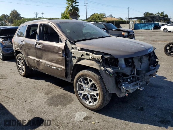 2019 Jeep Grand Cherokee Overland with VIN 1C4RJFCT7KC833390, listed as a Copart auction lot 74015774 with 64,598 mi miles and Salvage Title. Bid and sale history available at carsss.com. Image 4.