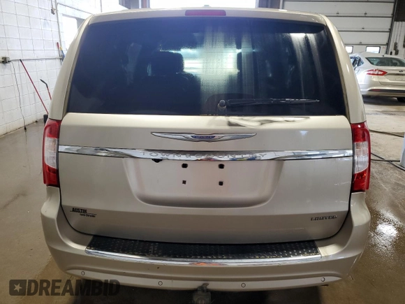 2014 Chrysler Town & Country Limited with VIN 2C4RC1GG3ER251812, listed as a Copart auction lot 61462694 with 99,992 mi miles and Salvage Title. Bid and sale history available at DreamBid. Image 6.