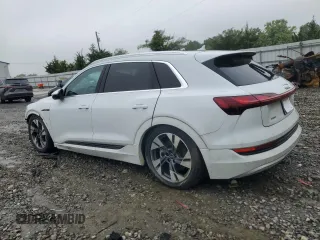 2021 Audi e-tron Premium z VIN WA1AAAGE2MB037094, wystawiony jako Copart lot #58707925 z przebiegiem Nie podano mil oraz Szkody całkowita. Historia ofert i sprzedaży dostępna na DreamBid. Obrazek 2.