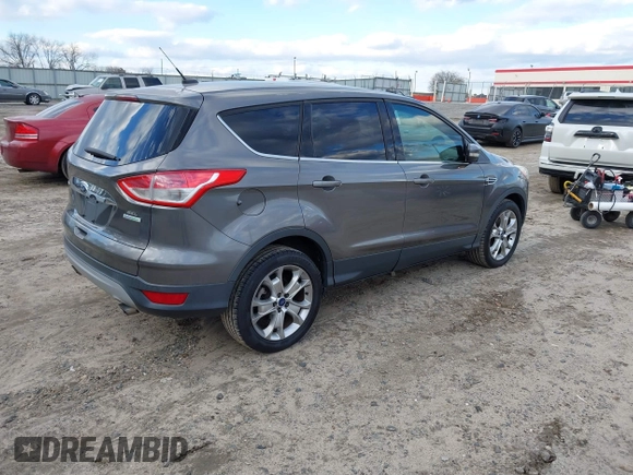 2013 Ford Escape SEL with VIN 1FMCU0HX8DUD68360, listed as a IAAI auction lot 41427968 with 129,067 mi miles. Bid and sale history available at carsss.com. Image 4.