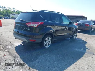 2013 Ford Escape SE with VIN 1FMCU0GX3DUA85432, listed as a IAAI auction lot 42018437 with Not Provided miles and . Bid and sale history available at DreamBid. Image 4.