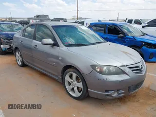 2005 Mazda 3 s with VIN JM1BK123951256977, listed as a IAAI auction lot 42388579 with 145,918 mi miles and . Bid and sale history available at DreamBid. Image 1.