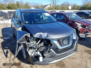 2017 Nissan Rogue S with VIN KNMAT2MV9HP542259, listed as a IAAI auction lot 41374906 with 107,217 mi miles. Bid and sale history available at carsss.com. Image 1.