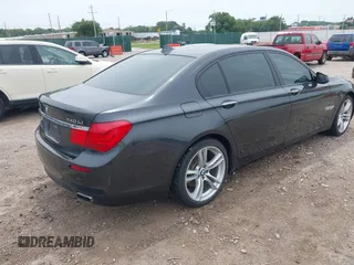 2011 BMW 7 Series 740Li with VIN WBAKB4C58BC574815, listed as a IAAI auction lot 42466704 with 155,292 mi miles and . Bid and sale history available at DreamBid. Image 4.