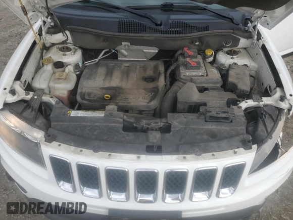2014 Jeep Compass Sport with VIN 1C4NJDBB7ED503825, listed as a Copart auction lot 49867255 with 116,663 mi miles and Salvage Title. Bid and sale history available at carsss.com. Image 12.