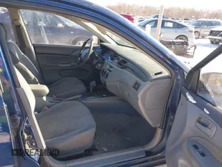 2003 Mitsubishi Lancer ES with VIN JA3AJ26E13U0A3996, listed as a IAAI auction lot 41251250 with 223,311 mi miles. Bid and sale history available at carsss.com. Image 5.