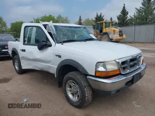 2000 Ford Ranger XLT with VIN 1FTZR15X3YPC05968, listed as a IAAI auction lot 42200954 with 157,626 mi miles and . Bid and sale history available at DreamBid. Image 1.