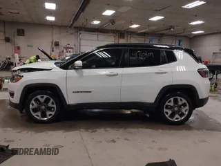 2021 Jeep Compass Limited with VIN 3C4NJCCB0MT576990, listed as a IAAI auction lot 41710809 with 77,903 mi miles. Bid and sale history available at carsss.com. Image 14.
