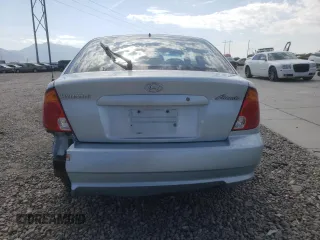 2005 Hyundai Accent GLS with VIN KMHCG35C55U341192, listed as a Copart auction lot 70708994 with 174,872 mi miles and Salvage Title. Bid and sale history available at carsss.com. Image 6.