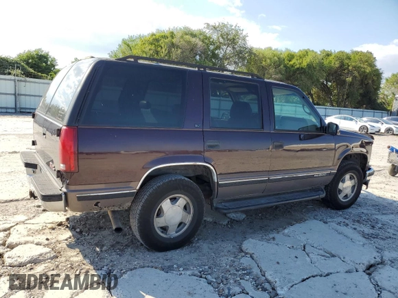 1997 GMC Yukon with VIN 1GKEK13R7VJ711782, listed as a Copart auction lot 74793184 with 208,718 mi miles and Salvage Title. Bid and sale history available at carsss.com. Image 3.