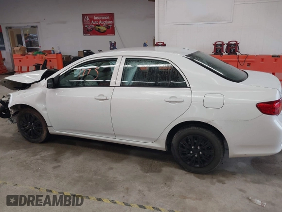 2009 Toyota Corolla z VIN 2T1BU40E89C129686, wystawiony jako IAAI lot #42251775 z przebiegiem 185 332 mil mil oraz . Historia ofert i sprzedaży dostępna na DreamBid. Obrazek 14.
