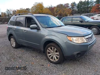 2013 Subaru Forester 2.5X Premium with VIN JF2SHADC1DH443259, listed as a IAAI auction lot 40685983 with 144,365 mi miles. Bid and sale history available at carsss.com. Image 1.