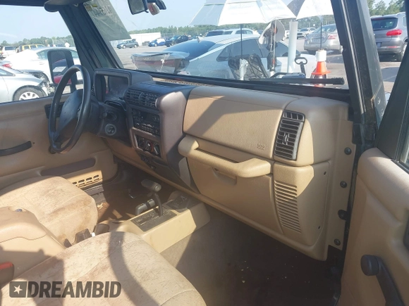 2002 Jeep Wrangler X with VIN 1J4FA39S72P733034, listed as a IAAI auction lot 42659447 with 200,786 mi miles and . Bid and sale history available at DreamBid. Image 5.