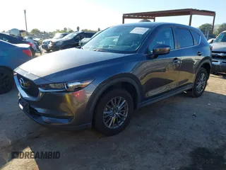 2017 Mazda CX-5 Touring with VIN JM3KFBCL2H0165625, listed as a IAAI auction lot 41879145 with 64,745 mi miles. Bid and sale history available at carsss.com. Image 17.