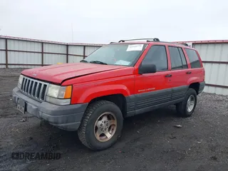 1996 Jeep Grand Cherokee Laredo with VIN 1J4GZ58Y3TC350926, listed as a IAAI auction lot 41224374 with 266,833 mi miles. Bid and sale history available at carsss.com. Image 2.