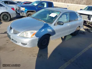 2004 Mitsubishi Lancer ES with VIN JA3AJ26E44U037047, listed as a IAAI auction lot 41545446 with 176,895 mi miles. Bid and sale history available at carsss.com. Image 2.