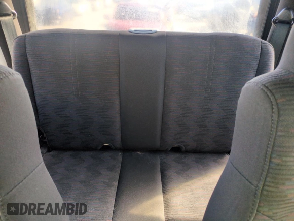 2004 Jeep Wrangler Sport z VIN 1J4FA49S64P751615, wystawiony jako Copart lot #55810895 z przebiegiem 128 165 mil mil oraz Szkoda całkowita • Salvage title. Historia ofert i sprzedaży dostępna na DreamBid. Obrazek 10.
