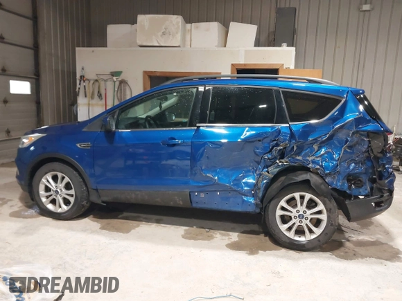 2017 Ford Escape SE with VIN 1FMCU0GD7HUB99218, listed as a IAAI auction lot 41941432 with 92,090 mi miles and . Bid and sale history available at DreamBid. Image 14.