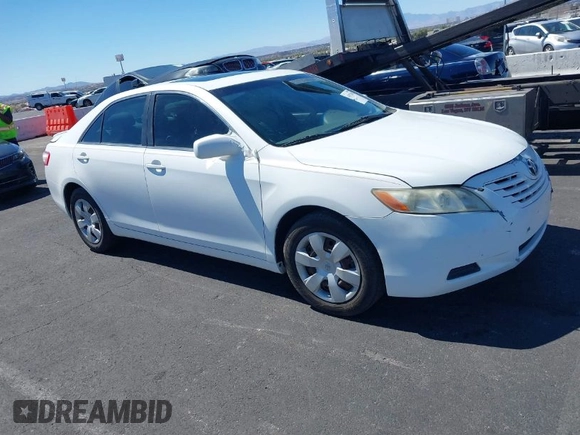 2007 Toyota Camry CE with VIN JTNBE46K473111827, listed as a IAAI auction lot 41872683 with 173,058 mi miles. Bid and sale history available at carsss.com. Image 1.