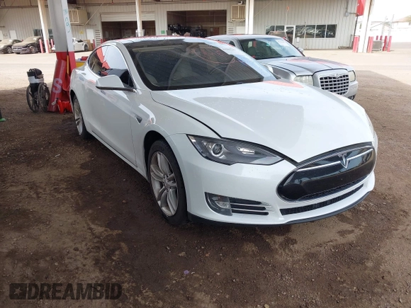 2013 Tesla Model S с VIN 5YJSA1CG8DFP22036, выставлен на аукционе IAAI как лот 41886249 с пробегом 125 477 миль миль и . История ставок и продаж доступна на DreamBid. Изображение 1.