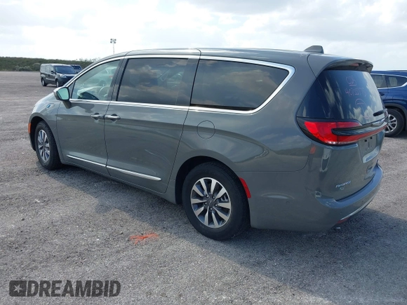 2022 Chrysler Pacifica Hybrid Limited z VIN 2C4RC1S71NR144989, wystawiony jako IAAI lot #40735375 z przebiegiem 61 361 mil mil oraz . Historia ofert i sprzedaży dostępna na DreamBid. Obrazek 3.