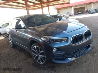 2020 BMW X2 sDrive28i with VIN WBXYH9C01L5P86316, listed as a IAAI auction lot 41427431 with 52,535 mi miles. Bid and sale history available at carsss.com. Image 1.