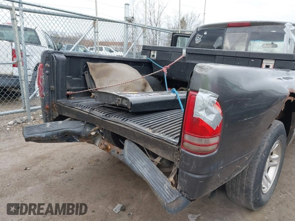 2002 Dodge Dakota with VIN 1B7GL12X22S644306, listed as a IAAI auction lot 41826999 with 198,069 mi miles and . Bid and sale history available at carsss.com. Image 6.
