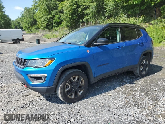 2018 Jeep Compass Trailhawk with VIN 3C4NJDDB7JT179423, listed as a Copart auction lot 61458605 with 100,949 mi miles and Salvage title. Bid and sale history available at DreamBid. Image 1.