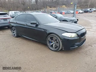 2013 BMW M5 with VIN WBSFV9C51DD095750, listed as a IAAI auction lot 40907304 with 93,014 mi miles. Bid and sale history available at carsss.com. Image 1.