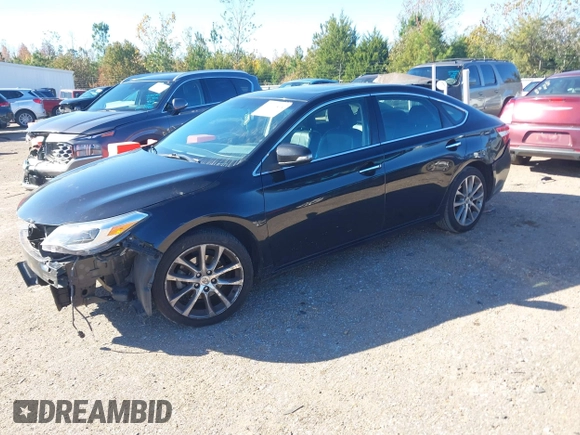 2014 Toyota Avalon Limited with VIN 4T1BK1EB4EU096164, listed as a IAAI auction lot 40904808 with 242,086 mi miles. Bid and sale history available at carsss.com. Image 16.