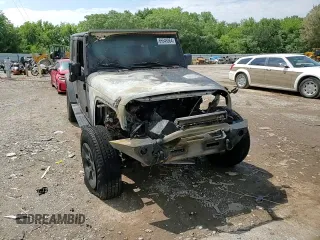 2007 Jeep Wrangler Unlimited Sahara z VIN 1J8GB59107L203053, wystawiony jako Copart lot #66549364 z przebiegiem Nie podano mil oraz Szkoda całkowita • Salvage title. Historia ofert i sprzedaży dostępna na DreamBid. Obrazek 10.