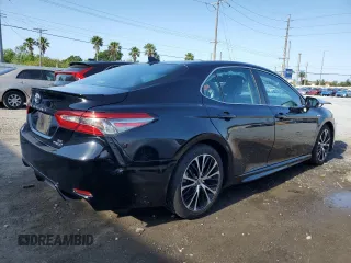 2019 Toyota Camry Hybrid LE z VIN 4T1B21HK1KU516390, wystawiony jako Copart lot #54856015 z przebiegiem 94 504 mil mil oraz Nie do naprawy • Non repairable. Historia ofert i sprzedaży dostępna na DreamBid. Obrazek 3.