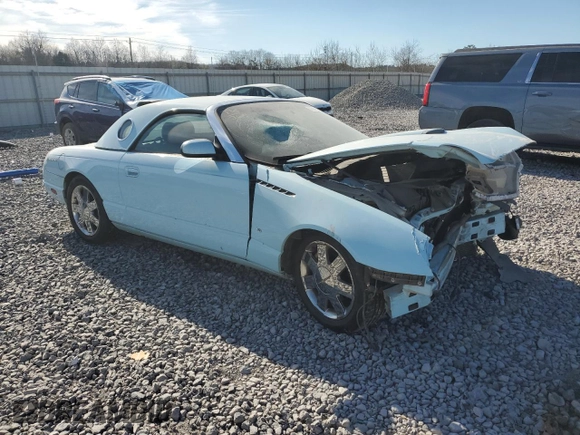 2003 Ford Thunderbird Deluxe z VIN 1FAHP60A73Y108590, wystawiony jako Copart lot #46895645 z przebiegiem Nie podano mil oraz Szkoda całkowita • Salvage title. Historia ofert i sprzedaży dostępna na DreamBid. Obrazek 4.