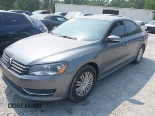 2014 Volkswagen Passat Wolfsburg Edition with VIN 1VWAS7A32EC070490, listed as a IAAI auction lot 42373146 with 53,706 mi miles and . Bid and sale history available at DreamBid. Image 2.