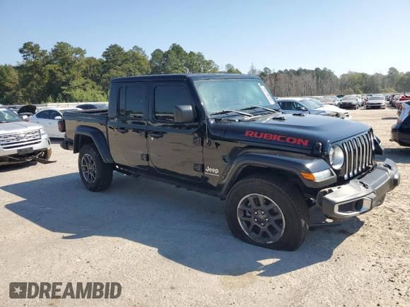 2023 Jeep Gladiator High Altitude with VIN 1C6HJTFG6PL523237, listed as a Copart auction lot 75999734 with 53,363 mi miles and Salvage title. Bid and sale history available at DreamBid. Image 4.