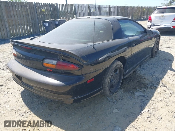 1998 Chevrolet Camaro Z28 z VIN 2G1FP22G2W2118336, wystawiony jako IAAI lot #42112851 z przebiegiem 122 385 mil mil oraz . Historia ofert i sprzedaży dostępna na DreamBid. Obrazek 4.