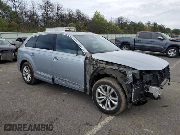 2017 Audi Q7 Premium with VIN WA1AAAF71HD043871, listed as a Copart auction lot 56669065 with 83,187 mi miles and Salvage title. Bid and sale history available at DreamBid. Image 4.