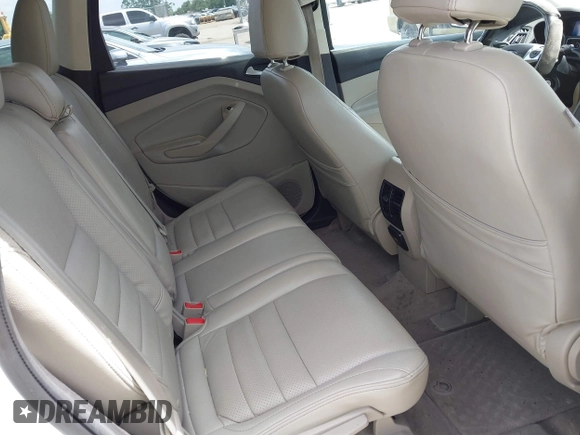 2013 Ford Escape SE with VIN 1FMCU0GX5DUA85464, listed as a IAAI auction lot 42452112 with 158,081 mi miles and . Bid and sale history available at DreamBid. Image 8.